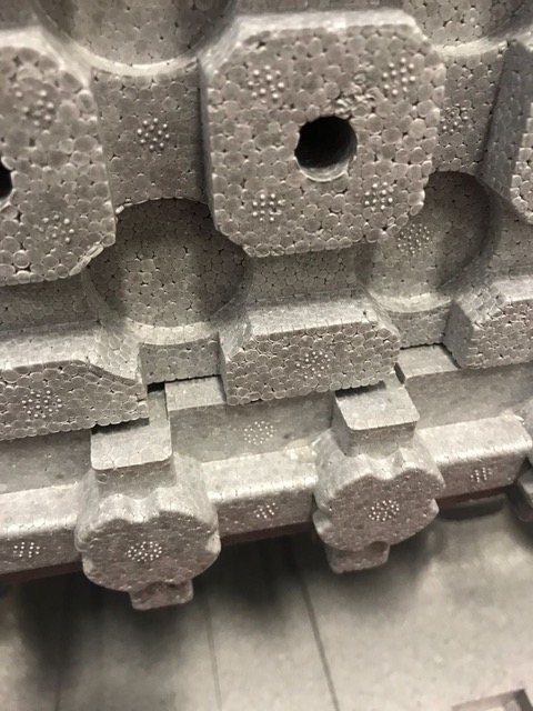 Close-up of the moulded interlocking teeth on an insulated formwork block